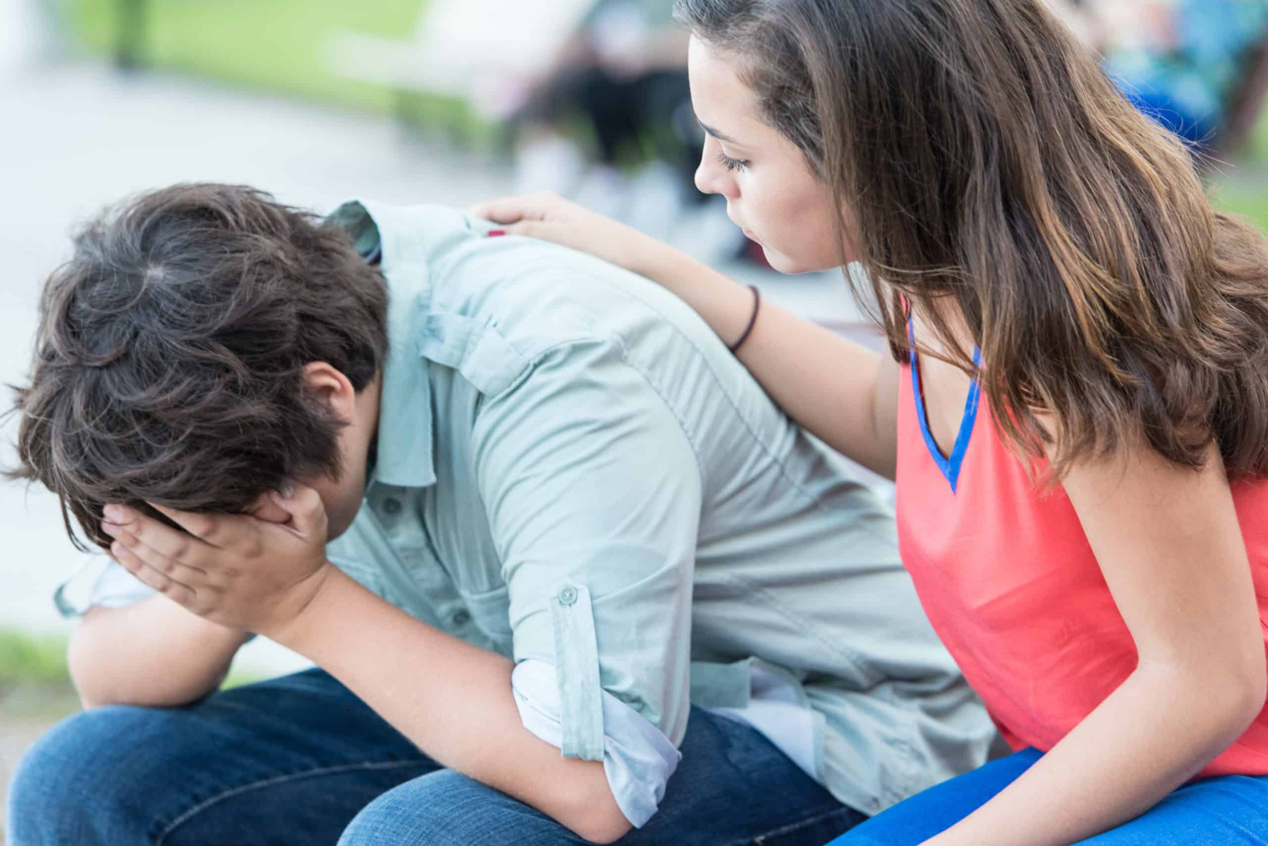 Sad Male Comforted By Friend