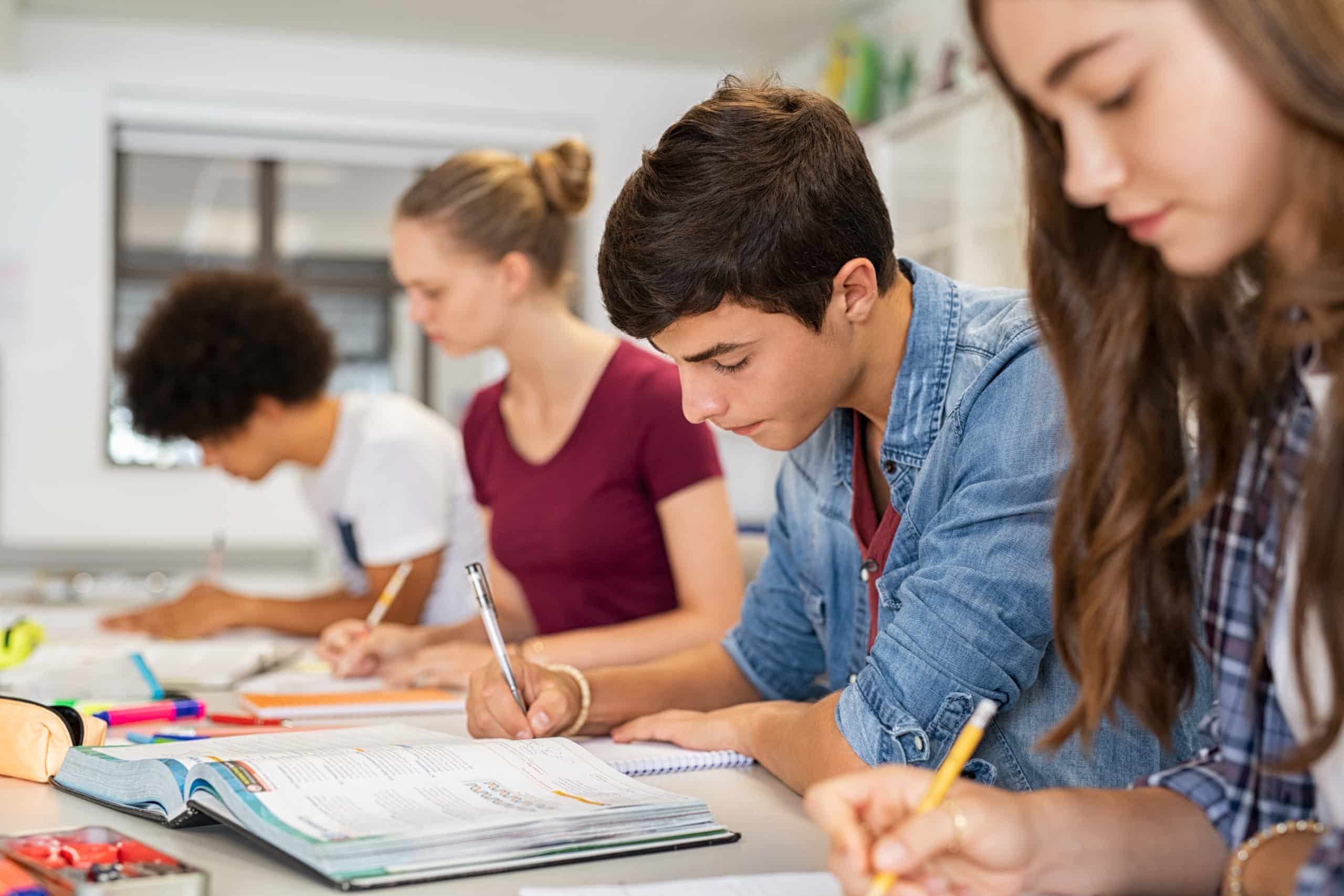 High School Students In Classroom Taking an Exam